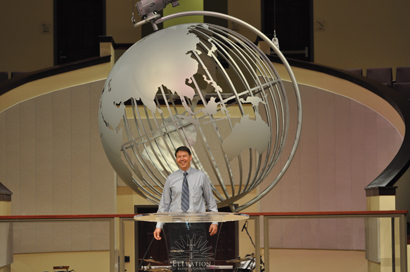 Eric Von Fange with globe at Elevation Baptist Church, Raleigh, NC