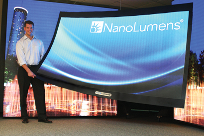 Will Amos, sales director, NanoLumens, with flexible LED video screen