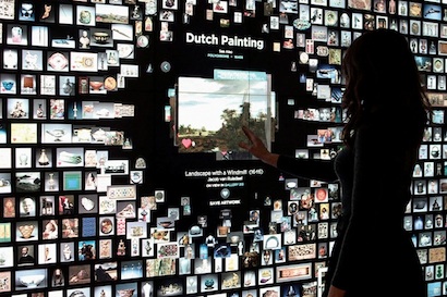 Visitors interact with Gallery One wall