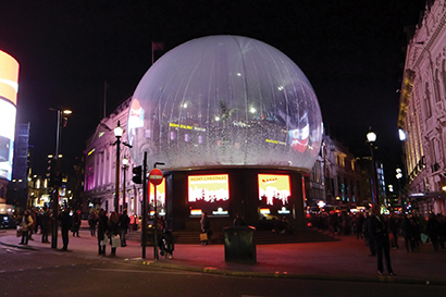 The base of the globe features eight Pixled F-6 LED screens from XL Video, arrayed in an octagonal shape