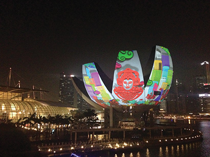 i Light Marina Bay 2014, held from March 7-30, featured projection-mapped visuals on the ArtScience museum. Local artist Justin Lee worked with Dorier Asia on the project, making use of a pair of coolux Pandoras Box QUAD Server systems along with 16 Panasonic PT-DZ21K projectors.