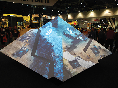 The Pyramid structure with 3D projection mapping in the Caterpillar booth