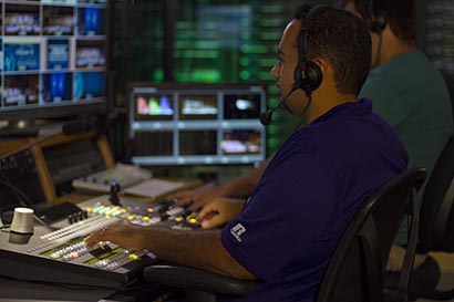 First Baptist Oviedo's Josh Felix (foreground) with Stan Brantley (background). The Florida church's technical crew members have been using a new FOR-A switcher to meet the Florida church's production needs this year.