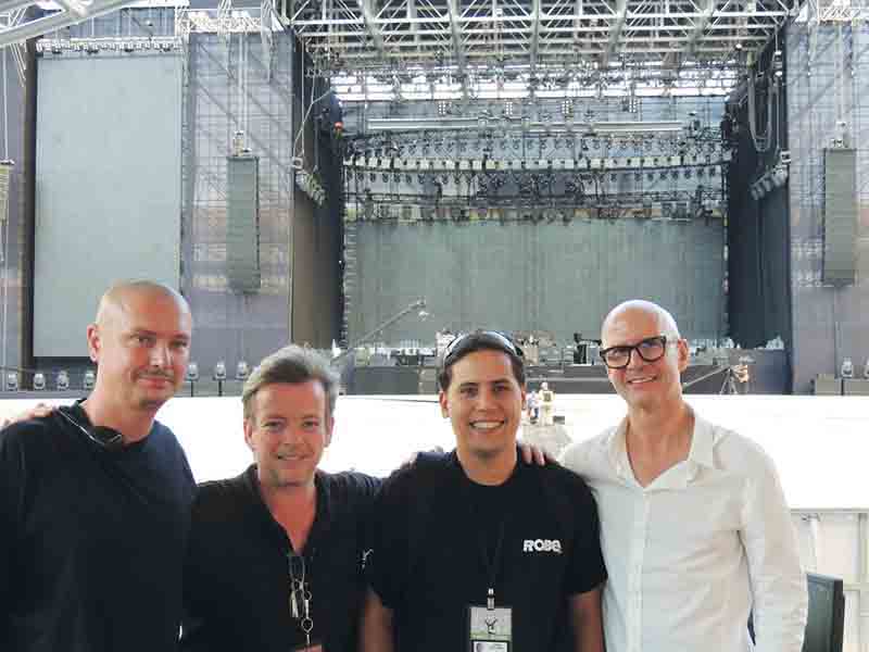 The “Out There” tour ran from 2013 to 2014, and LPL Professional Lighting supported the first shows in Brazil. Pictured here, from left, are soundman Thomas Walls, Wally Lees, Guillermo Traverso (with Robe) and Roy Bennett.