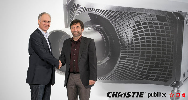 Publitec and Christie debut the Christie Boxer 4k30 at ISE Amsterdam. Klaus Hilles, Christie Regional Director, with Andreas Flemming, CEO of publitec.