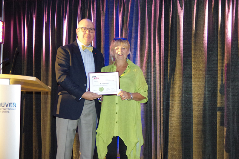 CITT President, Michael Harris, presenting the 2015 CITT Supplier Achievement Award to A.C. Lighting Inc.'s Chief Operating Officer, Penny Watier.