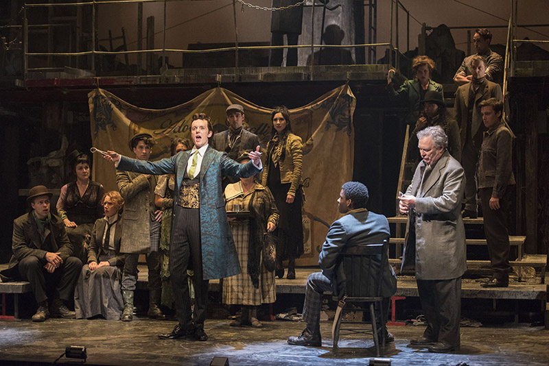 On Judith Bowden's skeletal set for the 'Sweeney Todd' production at the Shaw Festival in Nagara-on-the-Lake, Ontario, Kyle Blair as Adolfo Pirelli and Benedict Campbell as Sweeney Todd enter into a fateful competition. Photo by Emily Cooper.